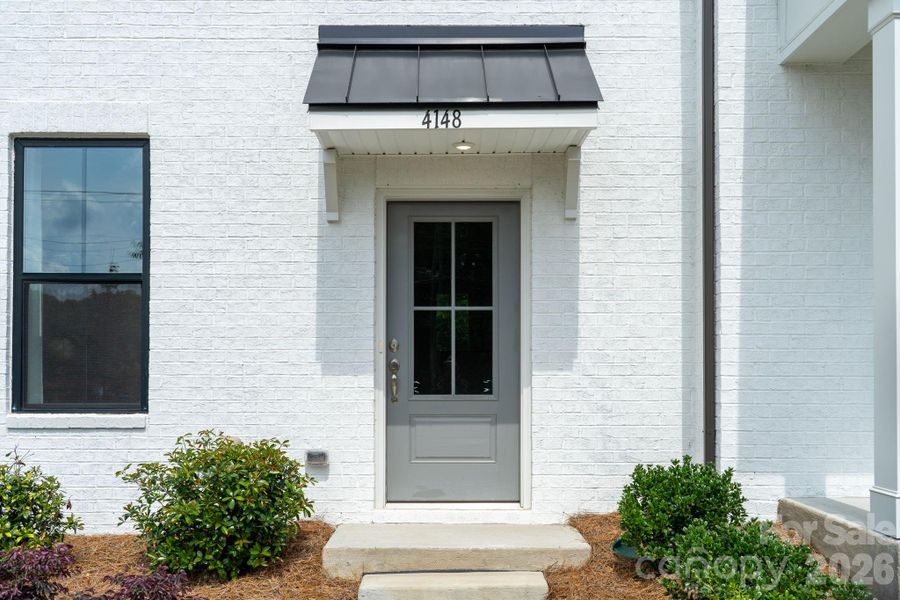 Exterior details and patio area of a home in Alexander Providence Townhomes, Charlotte (Image 4).