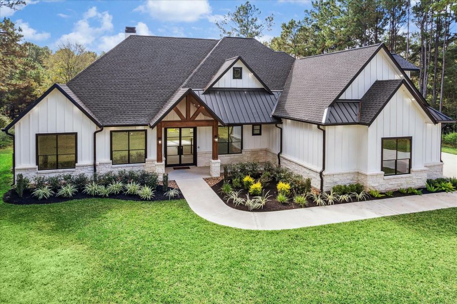 Front exterior of a new home in , Waller, TX, highlighting curb appeal (Image 2).