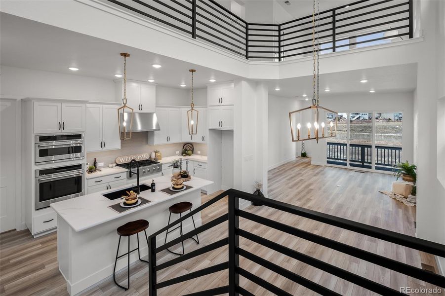 Furnished interior view inside a new home in Revel Crossing at Wolf Ranch - The Panorama Collection, Colorado Springs (Image 16).