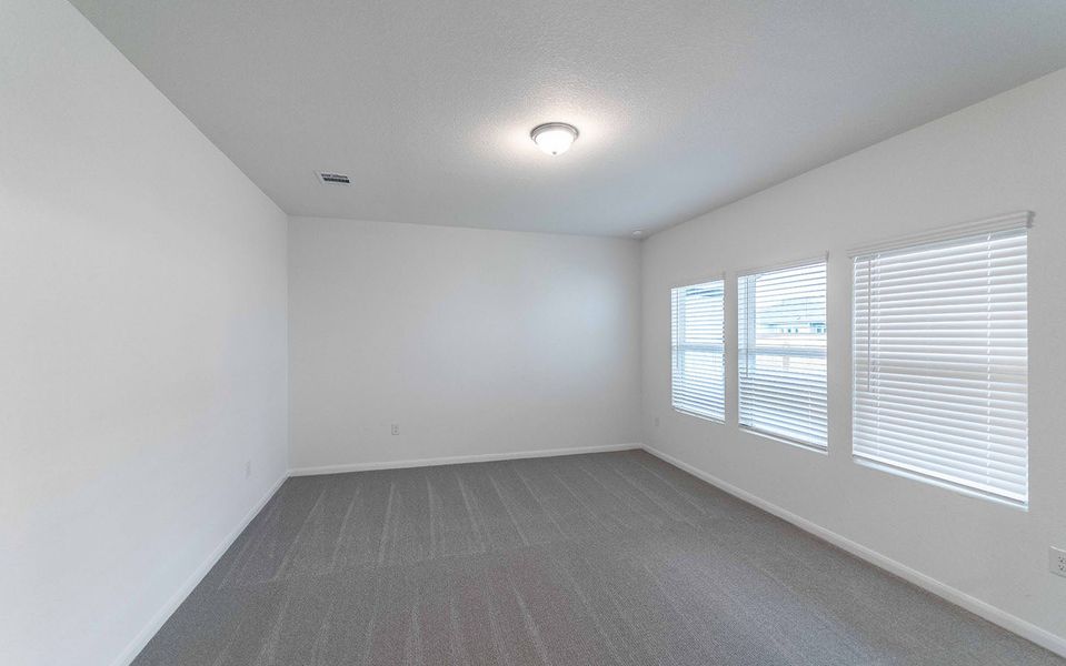 Spacious, unfurnished interior of a new home in Brooklands, Hutto (Image 13).