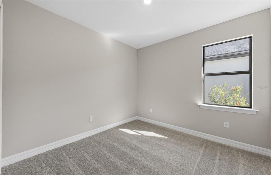 Spacious, unfurnished interior of a new home in The Strand at Cedar Grove, North Port (Image 36).