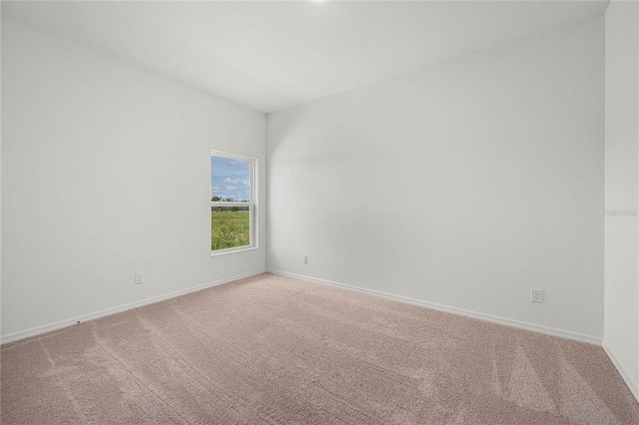 Spacious, unfurnished interior of a new home in Gum Lake Preserve, Lake Alfred (Image 13).