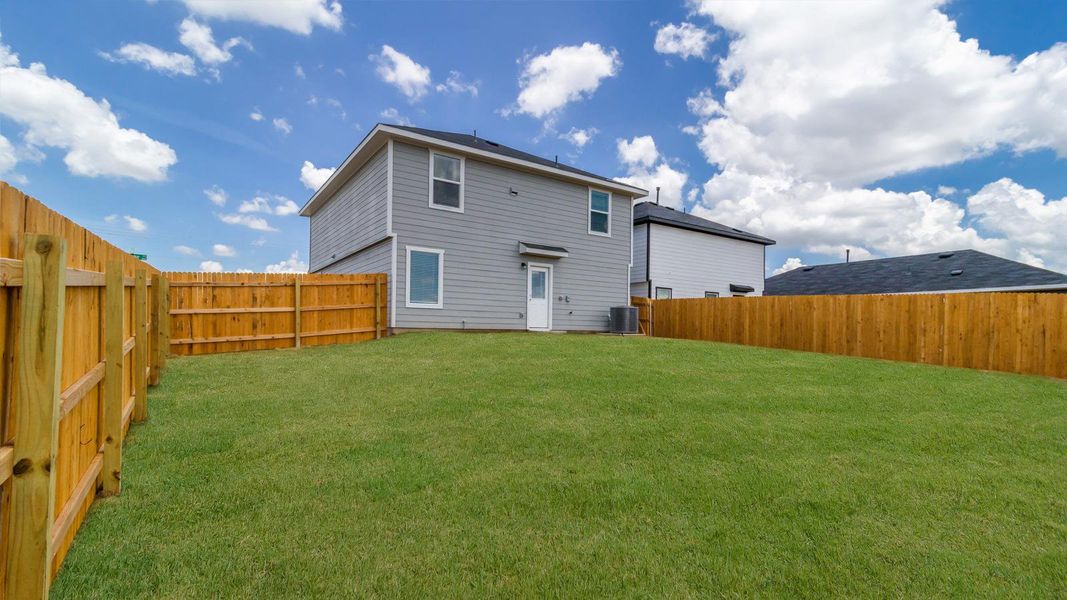 Exterior details and patio area of a home in Wayside, Uhland (Image 2). Exterior details and patio area of a home in Wayside, Uhland (Image 2).