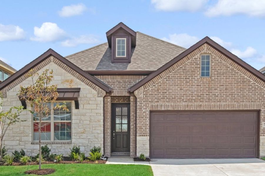Representative exterior photo of a completed home built from the Colorado Executive by UnionMain Homes in Wildflower Ranch, Justin, TX (Image 22).