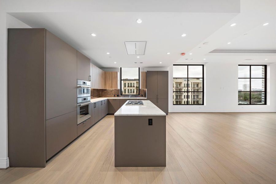 Well-appointed pantry provides essential storage, along will under cabinet lighting, updraft venting and soft close drawers. Well-appointed pantry provides essential storage, along will under cabinet lighting, updraft venting and soft close drawers.