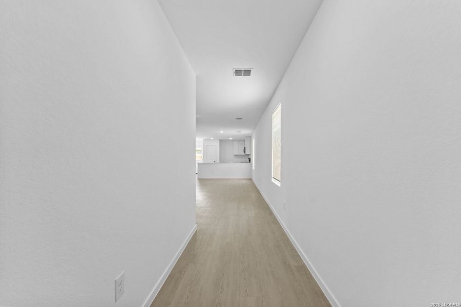 Spacious, unfurnished interior of a new home in Higdon Crossing, San Antonio (Image 26).