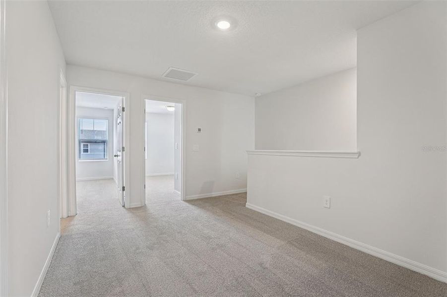 Spacious, unfurnished interior of a new home in Cagan Crossings West, Clermont (Image 26).