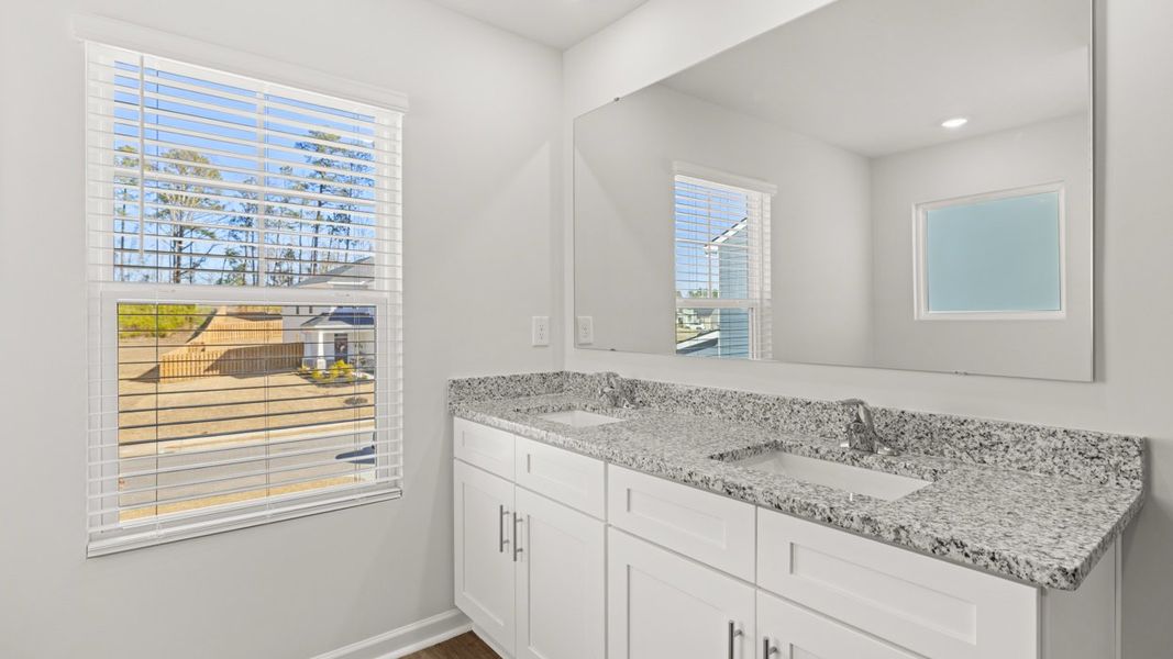 Representative furnished interior of a home built from the Halton by D.R. Horton in Southwind Village, Evans (Image 11).