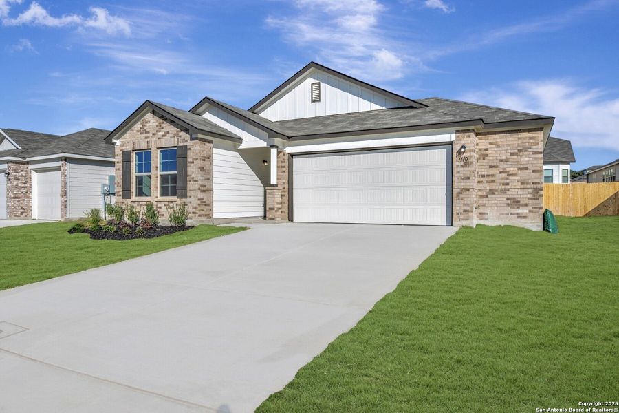 Front exterior of a new home in Greenspoint Heights, Seguin, TX, highlighting curb appeal (Image 2).