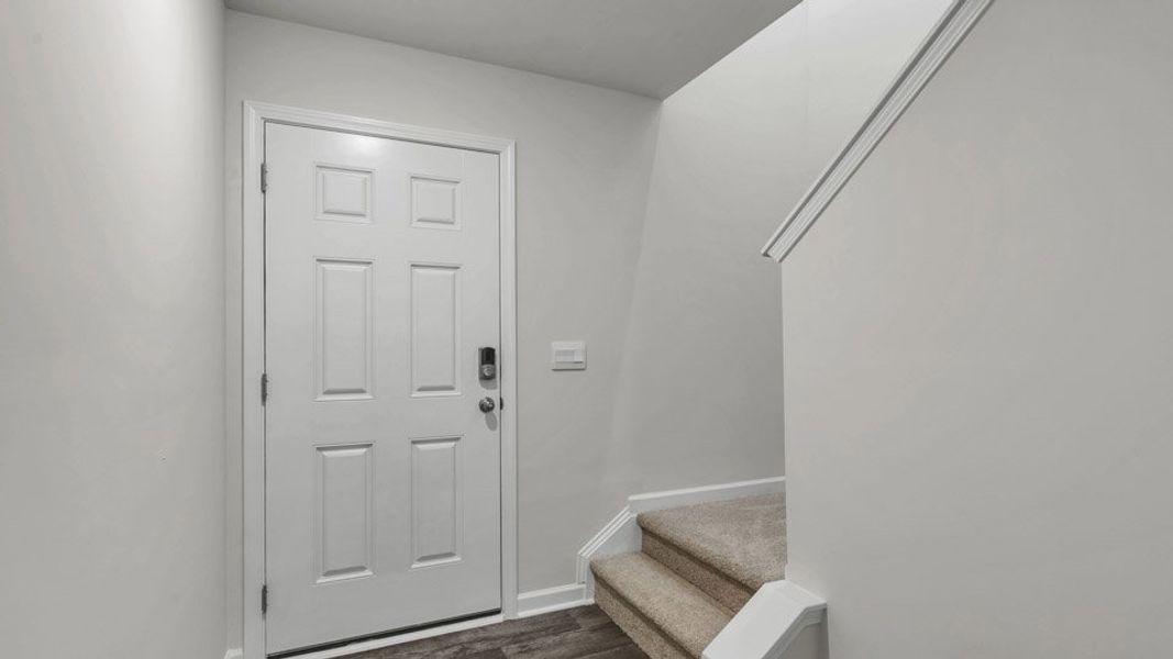 Spacious, unfurnished interior of a new home in The Townes at Honeycutt Oaks, Angier (Image 9). Spacious, unfurnished interior of a new home in The Townes at Honeycutt Oaks, Angier (Image 9).