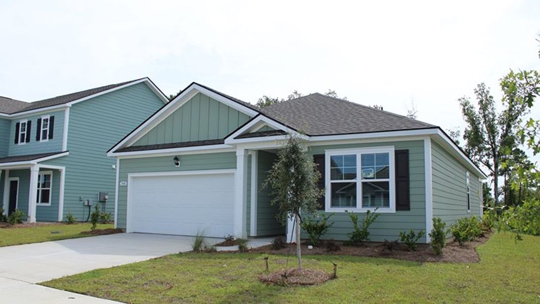 Front exterior of a new home in Kingston Bay, Conway, SC, highlighting curb appeal (Image 2).