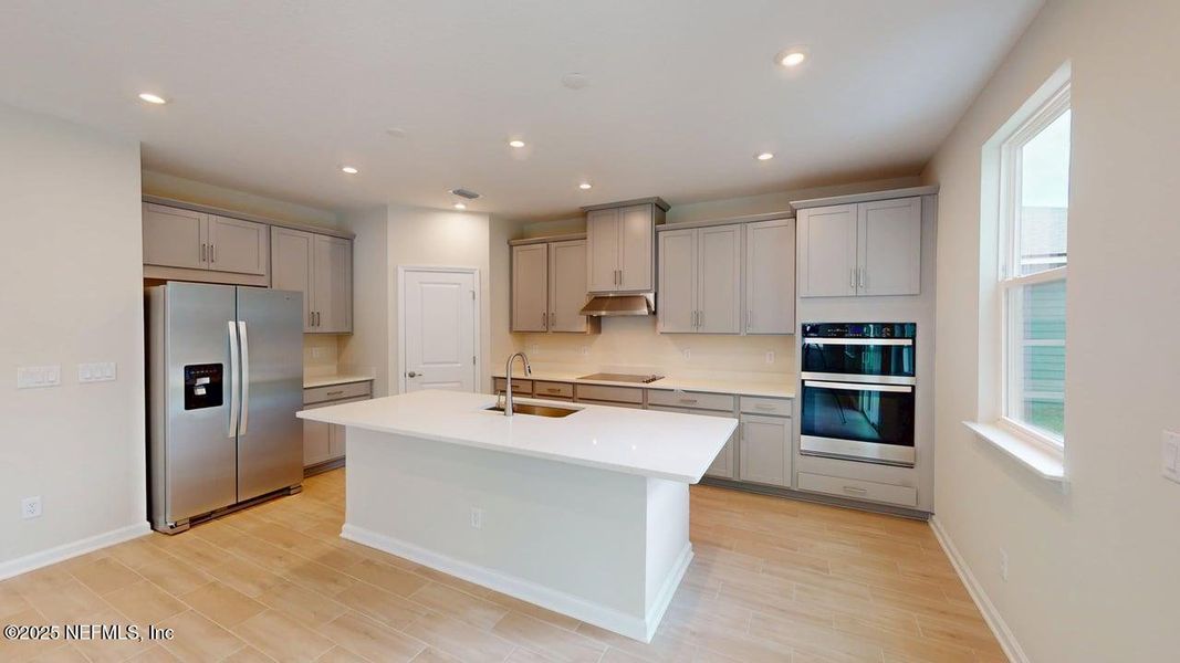 Furnished interior view inside a new home in Lakes at Bella Lago, Green Cove Springs (Image 6).