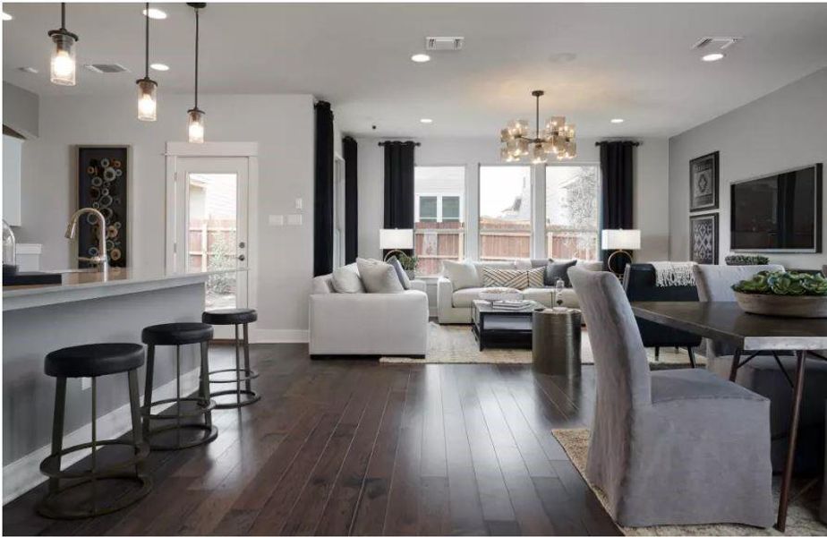 Photo of Pulte model home with same floor plan, not of actual home listed.