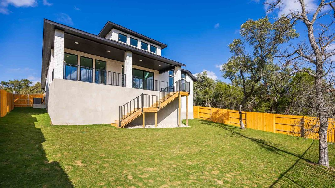 Exterior details and patio area of a home in Parkside On The River 60', Georgetown (Image 3).