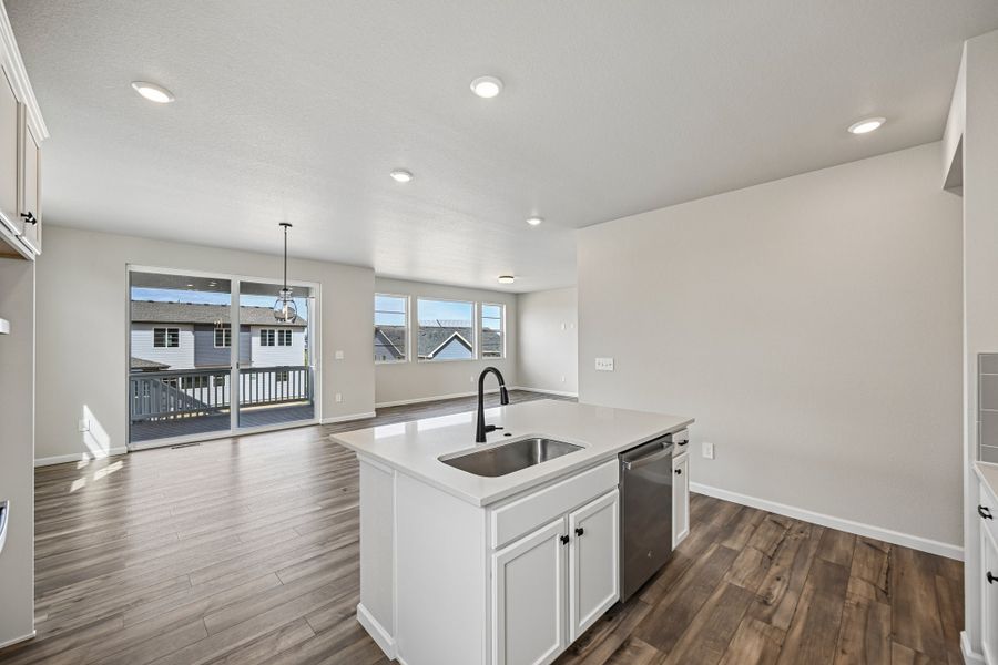 Furnished interior view inside a new home in The Aurora Highlands, Aurora (Image 6).