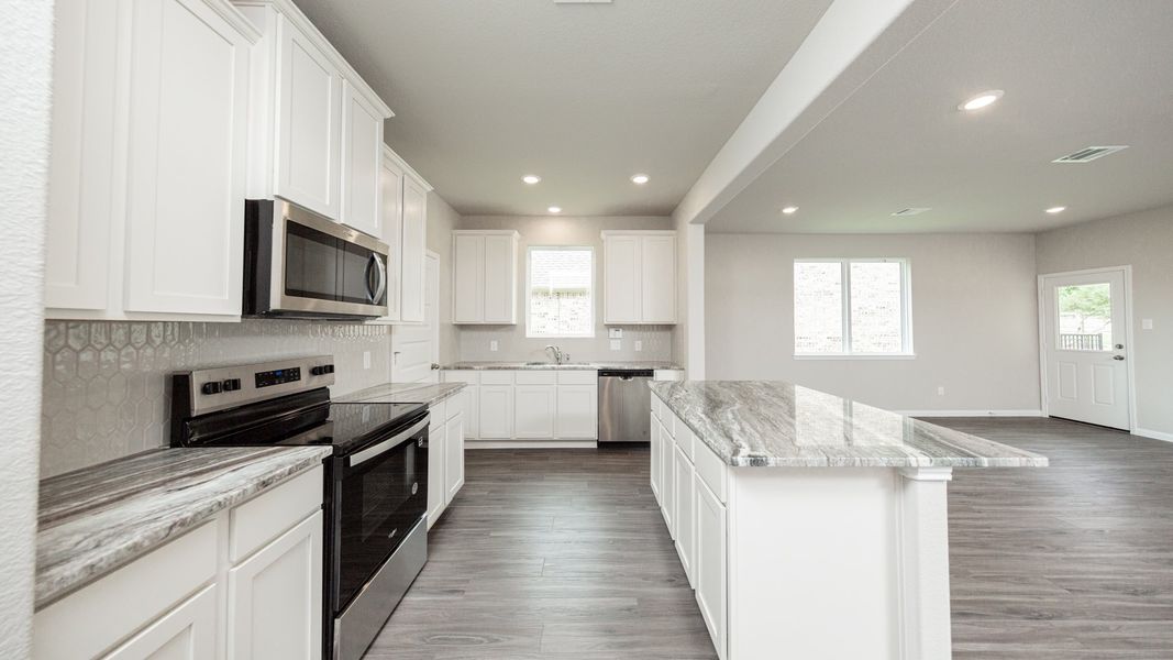Representative furnished interior of a home built from the The Avola - Walden on Lake Conroe by Legend Homes in Lake Conroe Area Homes, Montgomery (Image 5).