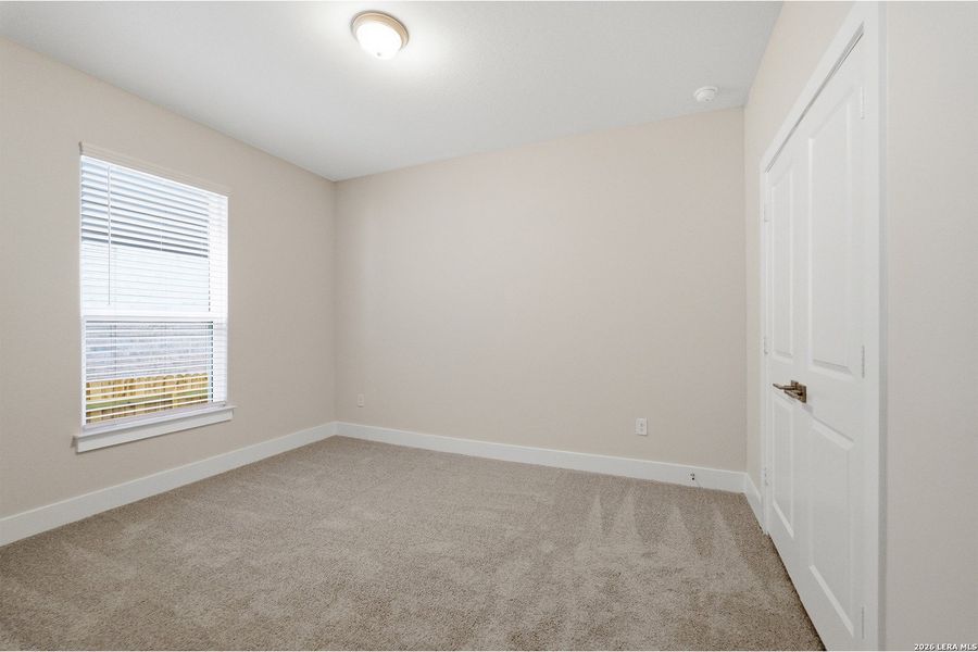 Spacious, unfurnished interior of a new home in The Woodlands at Medina Hills, Mico (Image 21).