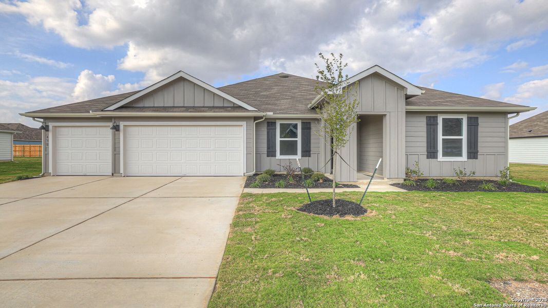Front exterior of a new home in Hartland Ranch, Lockhart, TX, highlighting curb appeal (Image 1). Front exterior of a new home in Hartland Ranch, Lockhart, TX, highlighting curb appeal (Image 1).