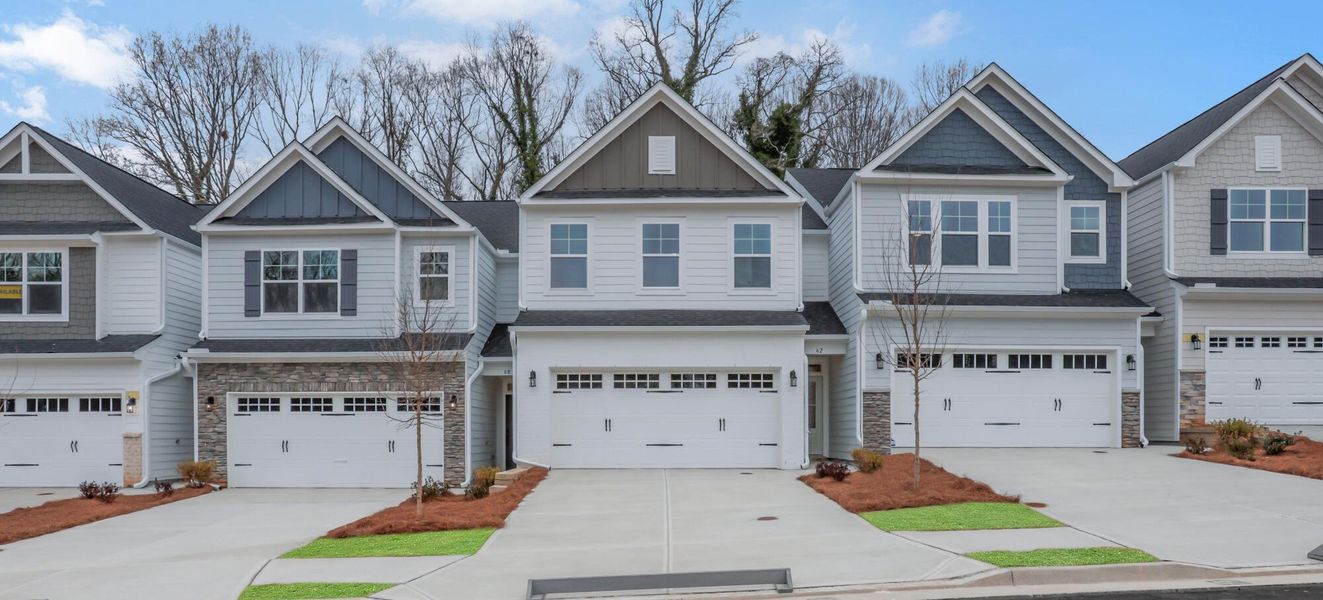 Front exterior of a new home in Villas at Dawsonville Townhomes, Dawsonville, GA, highlighting curb appeal (Image 23).