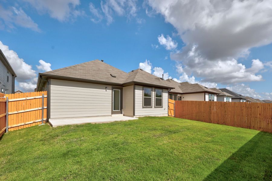 Exterior details and patio area of a home in Trinity Ranch, Elgin (Image 21).