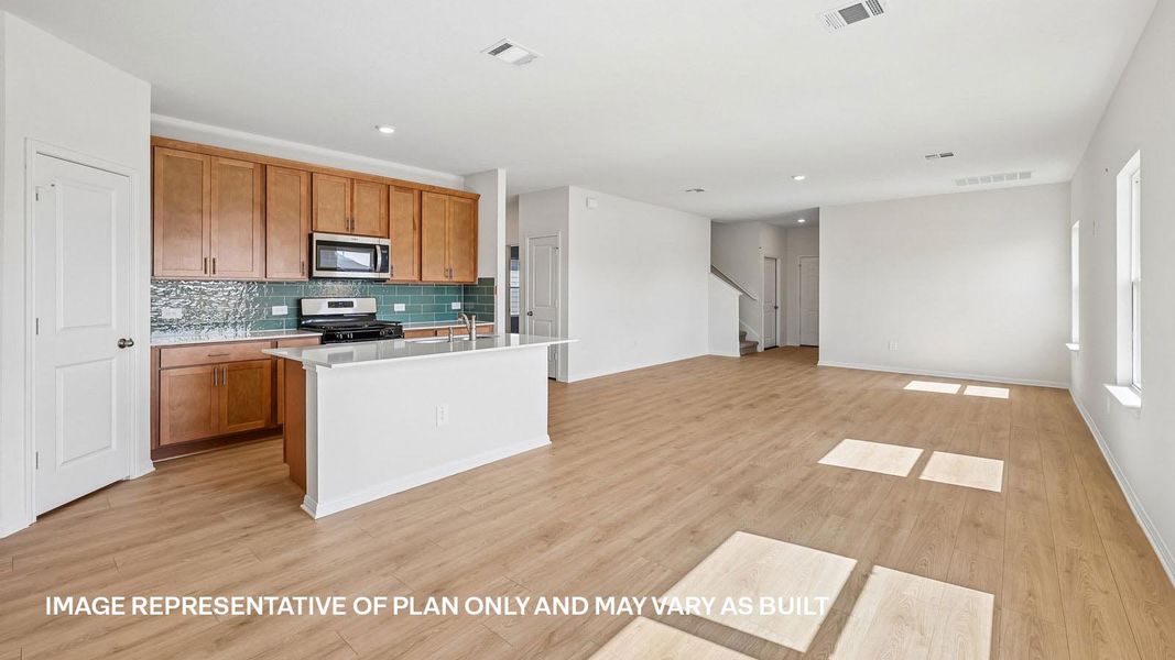 Furnished interior view inside a new home in Carillon, Manor (Image 4).