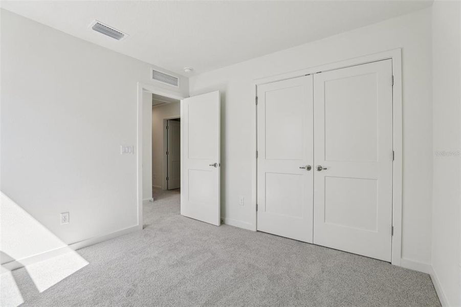 Spacious, unfurnished interior of a new home in Trinity Place, St. Cloud (Image 31).