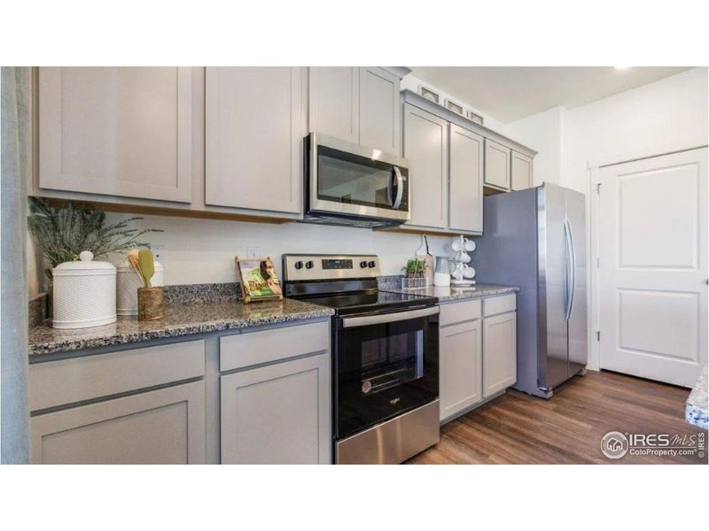 Furnished interior view inside a new home in Fossil Creek Ranch, Windsor (Image 9).
