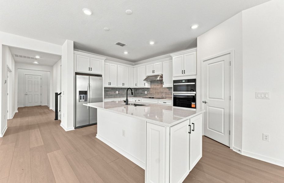 Furnished interior view inside a new home in Seaire, Parrish (Image 8).