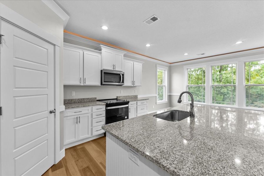 Representative furnished interior of a home built from the Emilia Elite by Enchanted Homes in Smokey Hills, Campobello (Image 13).