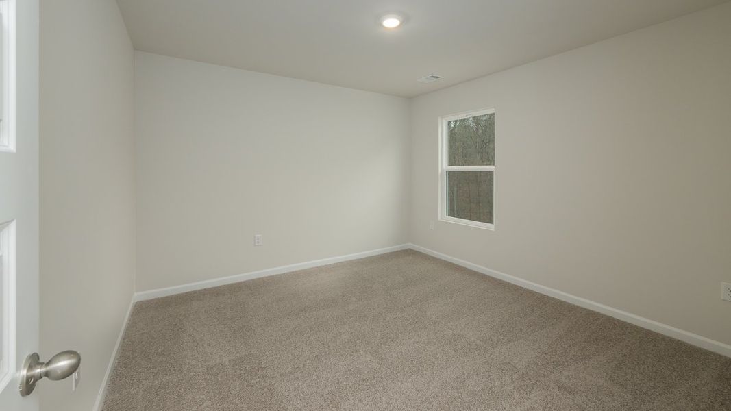 Spacious, unfurnished interior of a new home in Brooks Station, Dacula (Image 29).