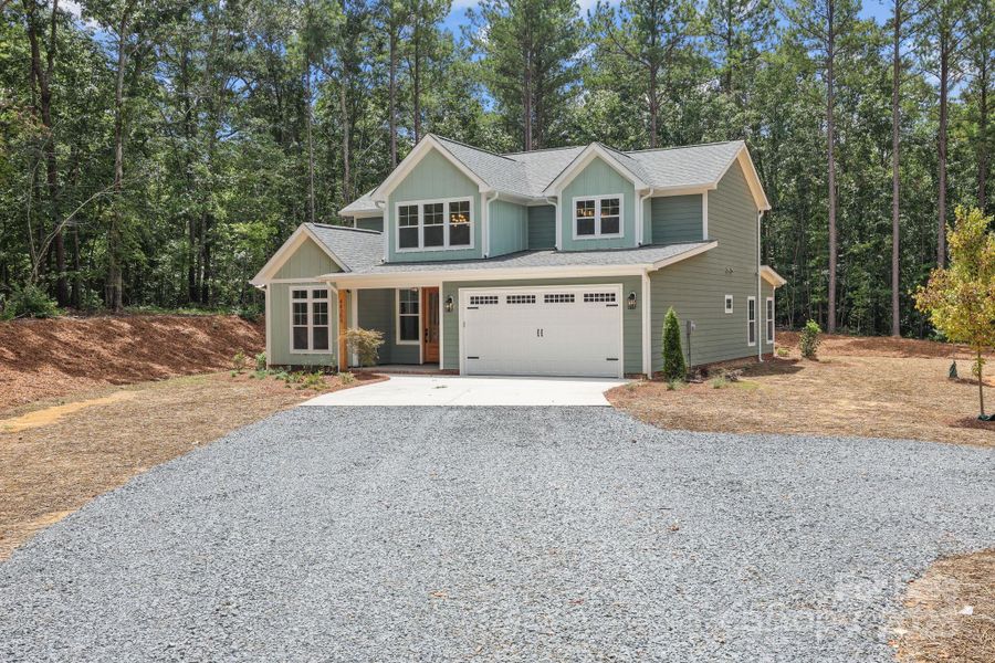 Front exterior of a new home in , Richfield, NC, highlighting curb appeal (Image 25).