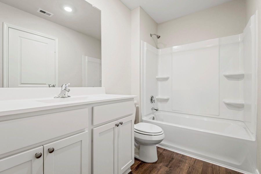 Furnished interior view inside a new home in Cypress Trails at Bauer Landing, Hockley (Image 5).