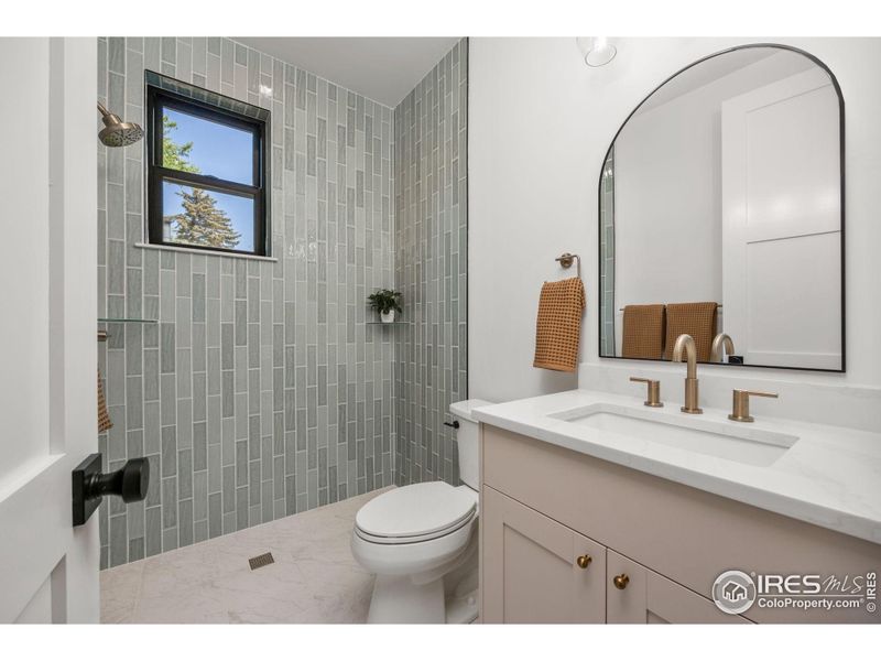 Main Floor 3/4  Bathroom with Heated Floor - Shower door coming soon.