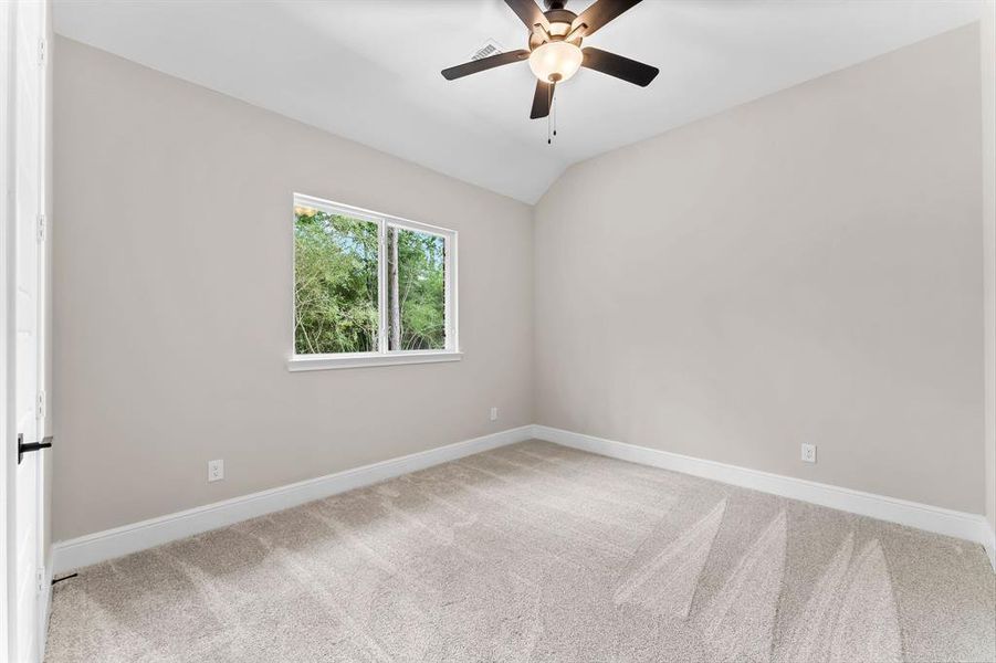 Secondary bedrooms include plush carpet and ceiling fans