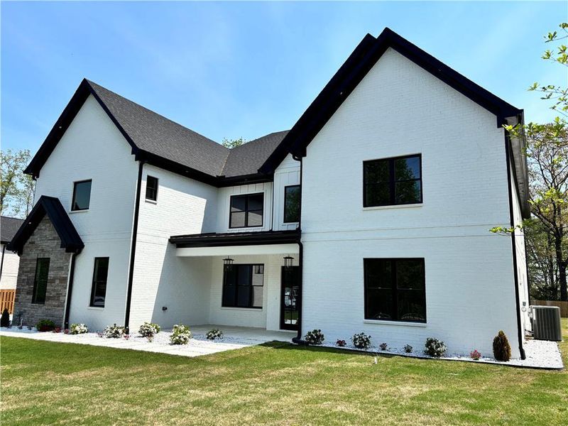 Front exterior of a new home in , Buford, GA, highlighting curb appeal (Image 34).