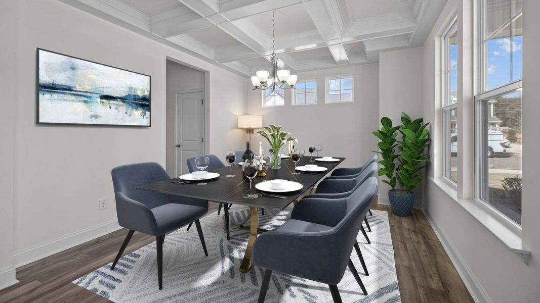 Formal Dining room with luxurious coffered ceiling in the Fairfield Design by DRB Homes Formal Dining room with luxurious coffered ceiling in the Fairfield Design by DRB Homes