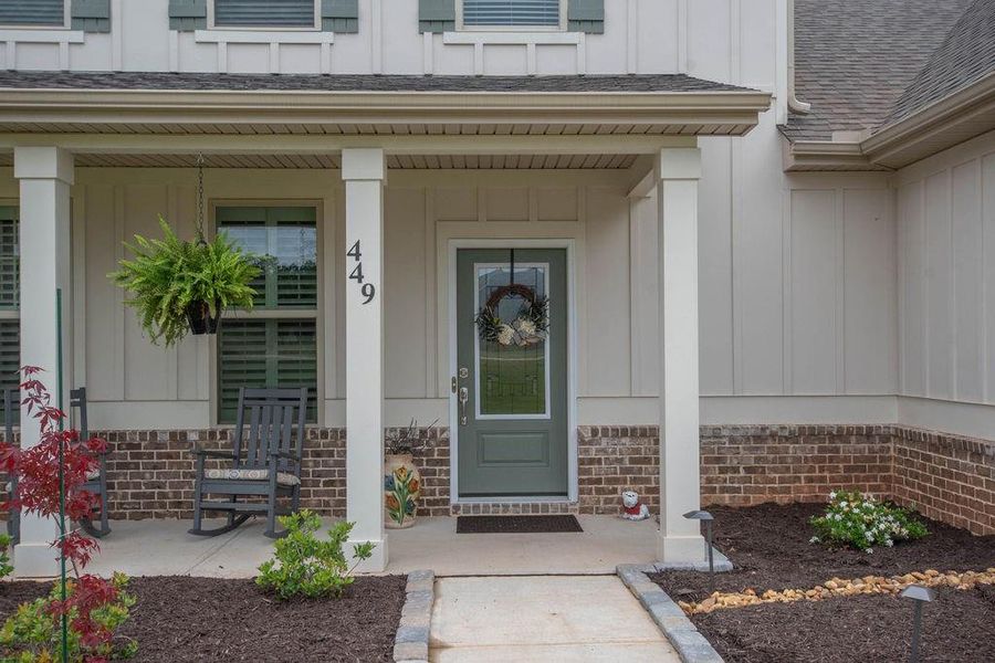 Front exterior of a new home in , Senoia, GA, highlighting curb appeal (Image 33). Front exterior of a new home in , Senoia, GA, highlighting curb appeal (Image 33).