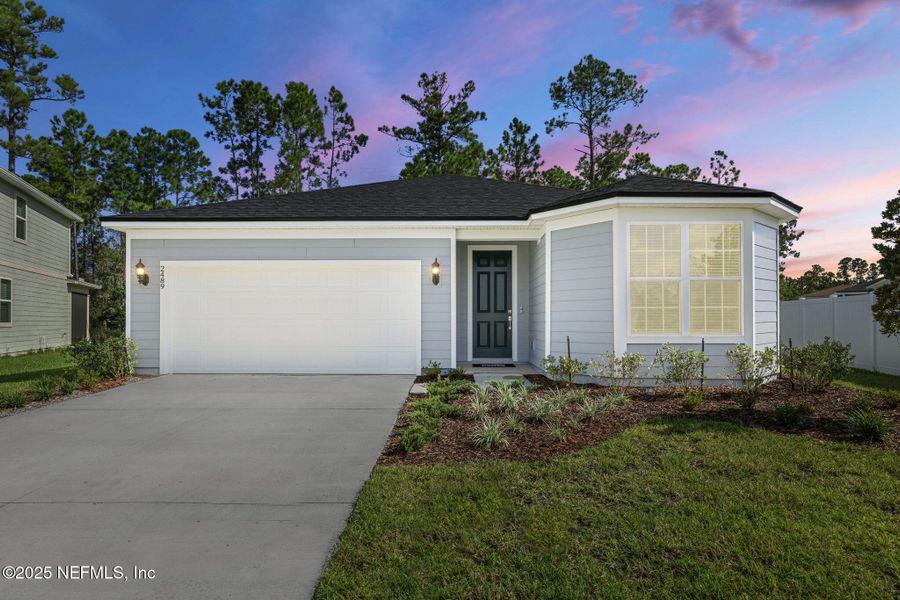 Front exterior of a new home in Bradley Creek, Green Cove Springs, FL, highlighting curb appeal (Image 2). Front exterior of a new home in Bradley Creek, Green Cove Springs, FL, highlighting curb appeal (Image 2).
