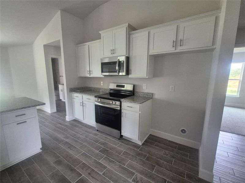 Furnished interior view inside a new home in Hill Country Estates, Dade City (Image 42).