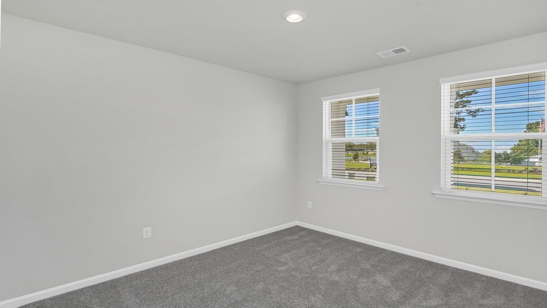 Spacious, unfurnished interior of a new home in Sease's Pond, Gilbert (Image 32).