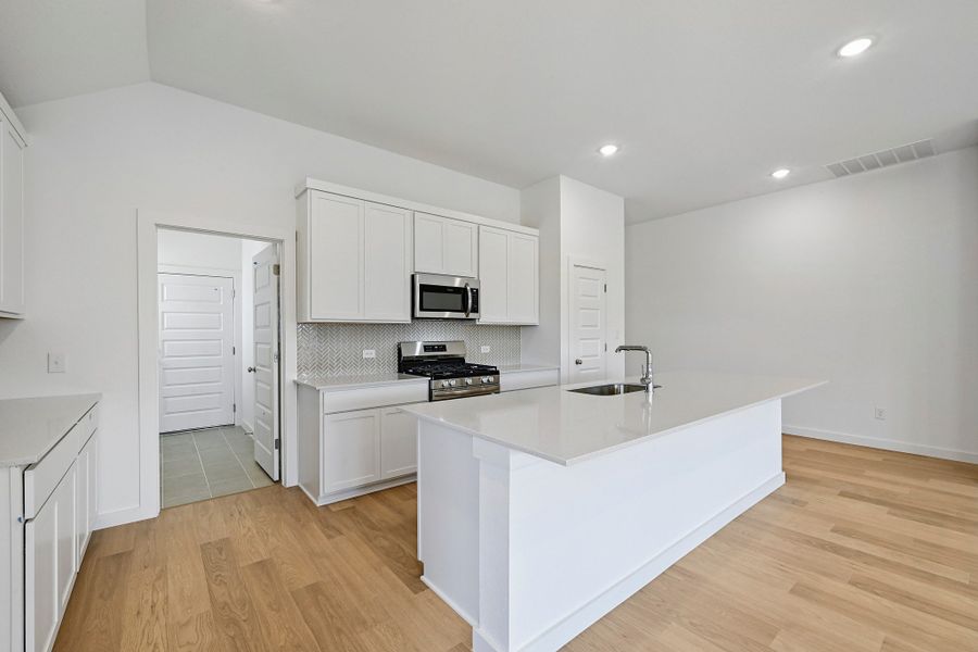 Furnished interior view inside a new home in Prairie Winds, Hutto (Image 7).