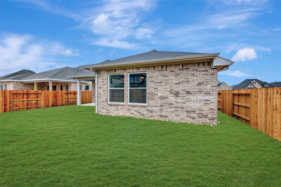 Exterior details and patio area of a home in The Grand Prairie 50’, Hockley (Image 3).