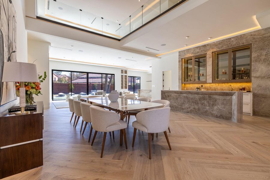 Open dining and kitchen layout designed for entertaining. Open dining and kitchen layout designed for entertaining.