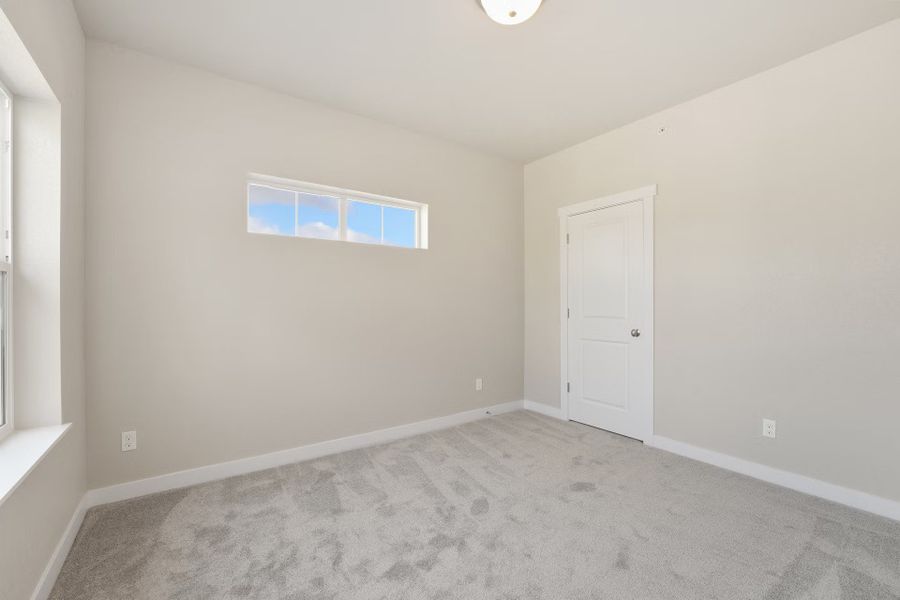 Spacious, unfurnished interior of a new home in The Lakes at Centerra - Discovery, Loveland (Image 9). Spacious, unfurnished interior of a new home in The Lakes at Centerra - Discovery, Loveland (Image 9).