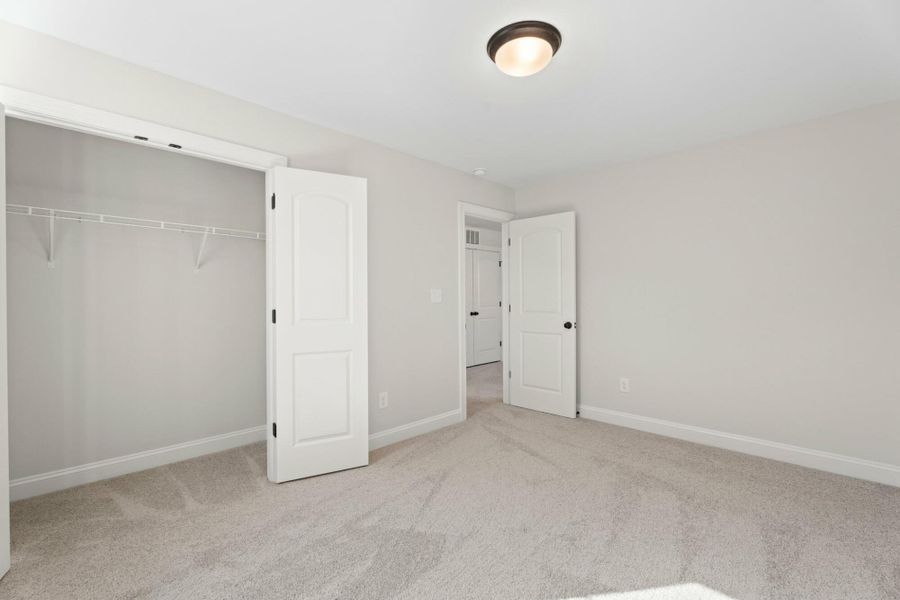 Spacious, unfurnished interior of a new home in Cottages at Piper Village, Trinity (Image 27).