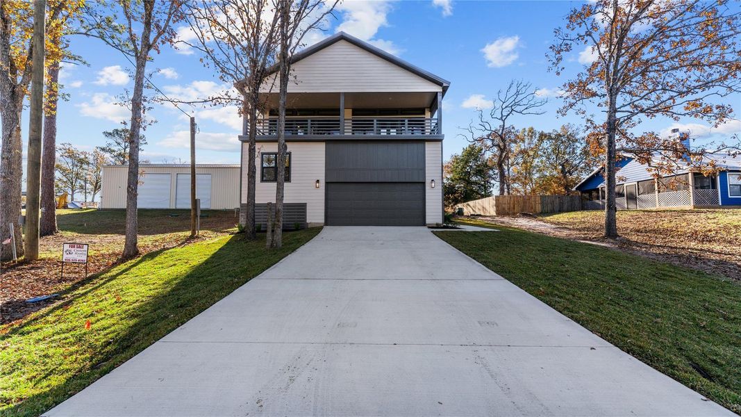 Front exterior of a new home in , Livingston, TX, highlighting curb appeal (Image 2).