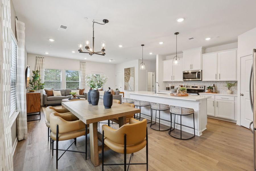 The open-concept floorplan allows for an easy flow between the kitchen and dining areas.