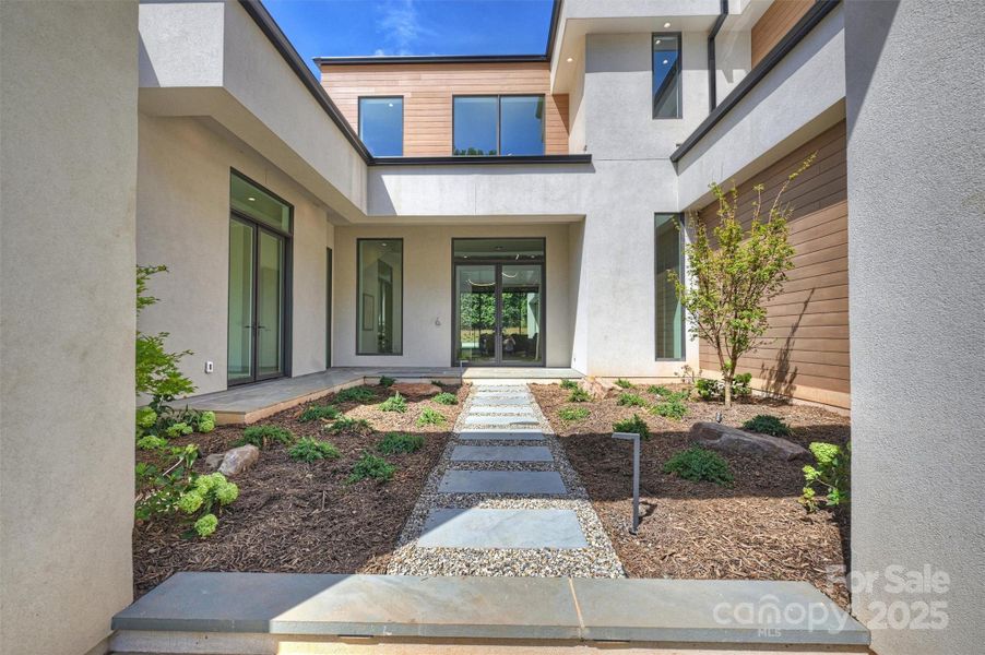 Front exterior of a new home in , Charlotte, NC, highlighting curb appeal (Image 23). Front exterior of a new home in , Charlotte, NC, highlighting curb appeal (Image 23).