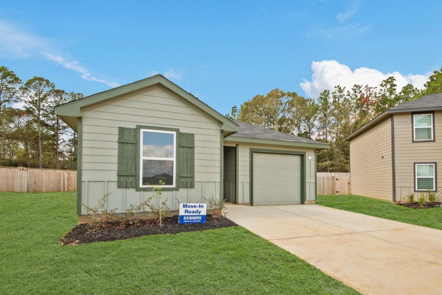 Front exterior of a new home in McCrorey Trails, Conroe, TX, highlighting curb appeal (Image 2).