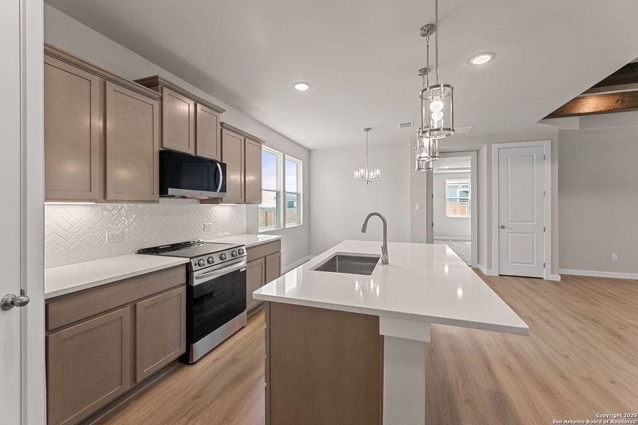 Furnished interior view inside a new home in Highland Ridge, New Braunfels (Image 9).